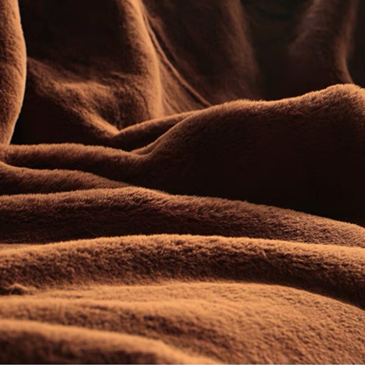 Zachte fleece plaid – Warme en stijlvolle deken in bruin