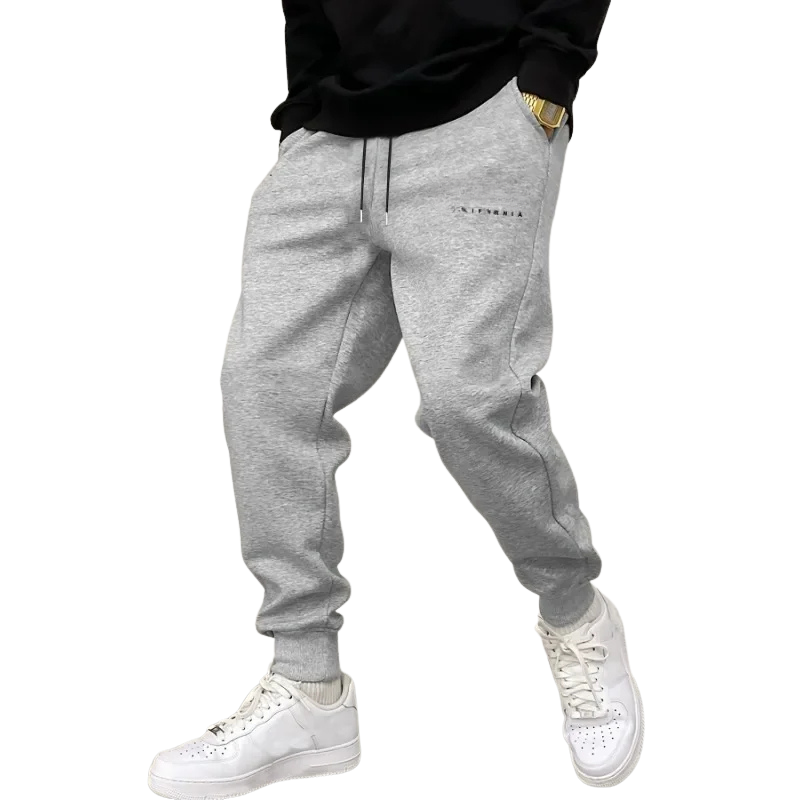 Heren joggingbroek slim fit met elastische tailleband en koord, zijzakken, sportieve trainingsbroek