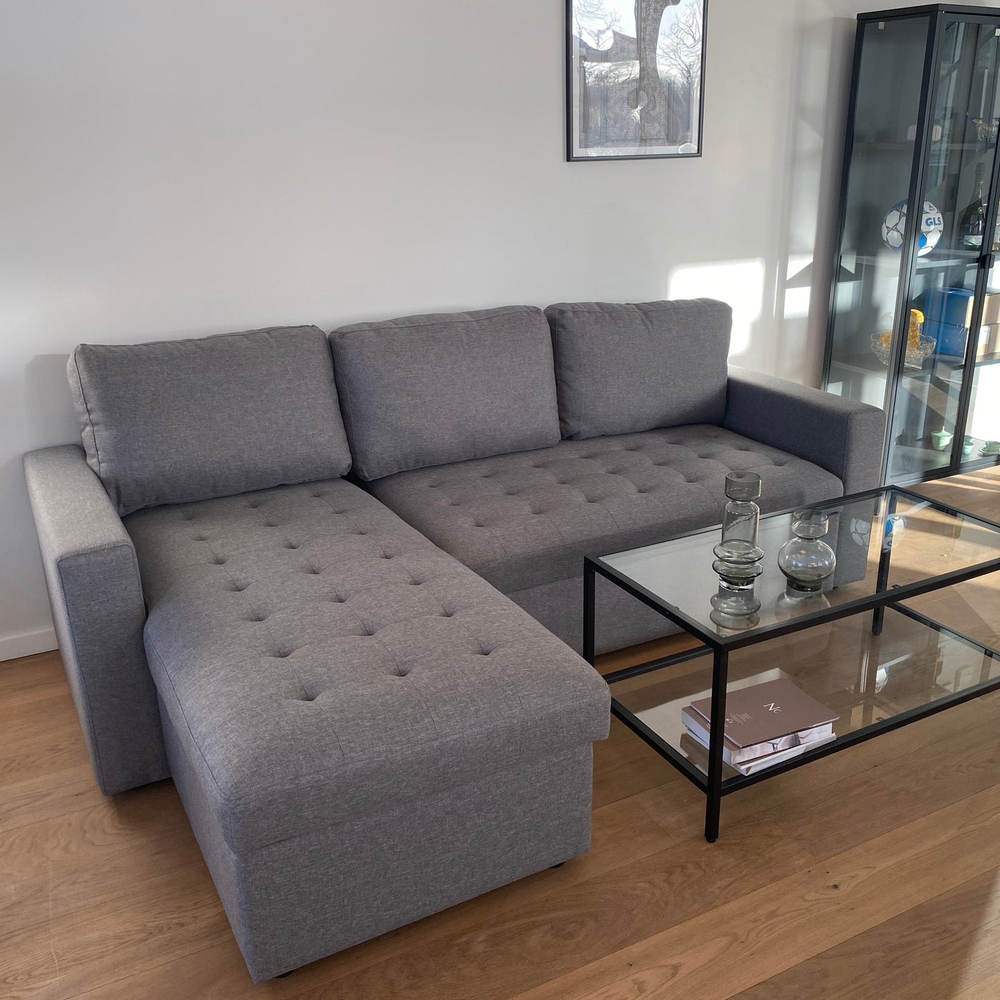 Sinus grijze slaapbank met chaise longue en opbergruimte